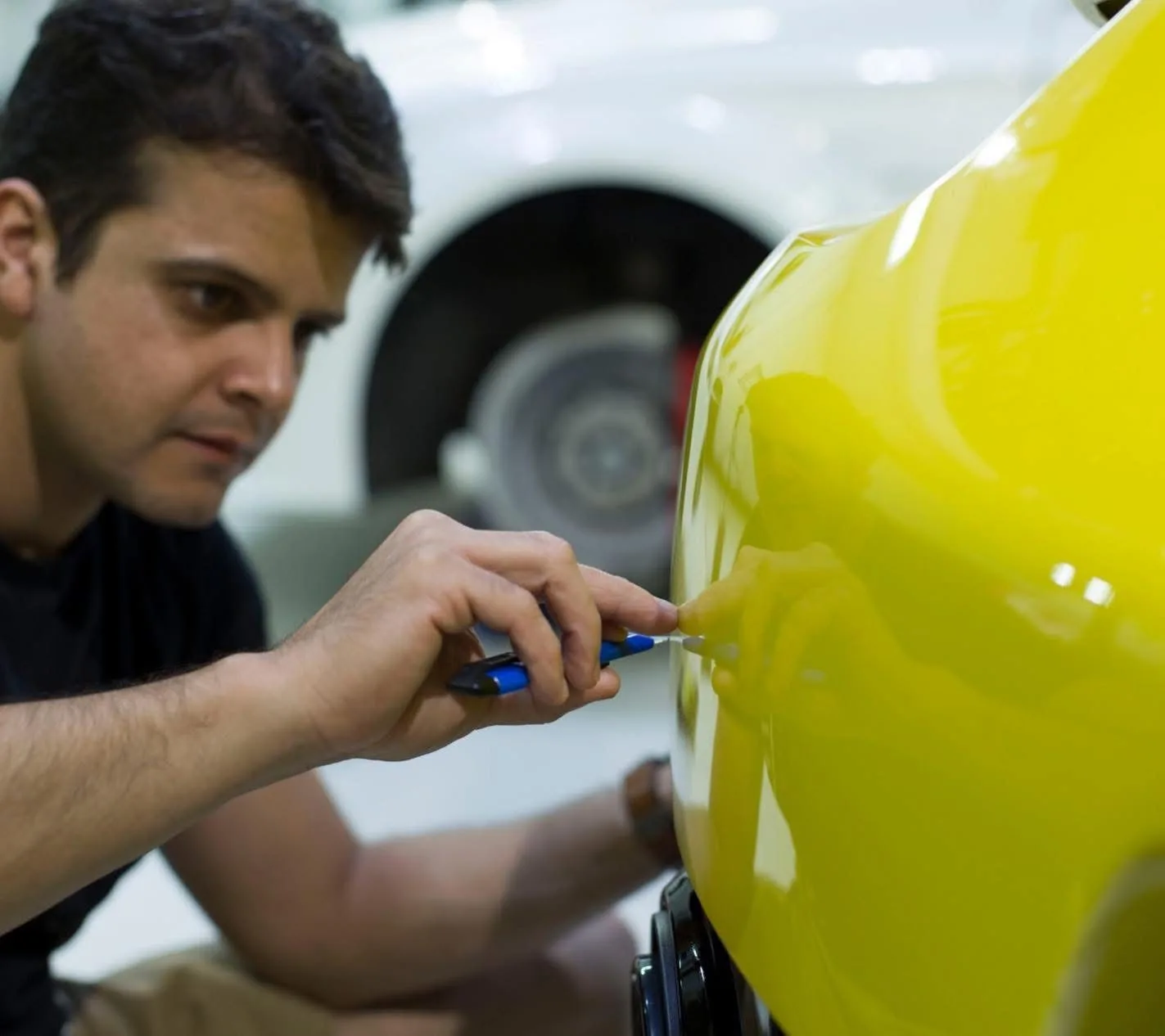 Imprint installer working on yellow exotic