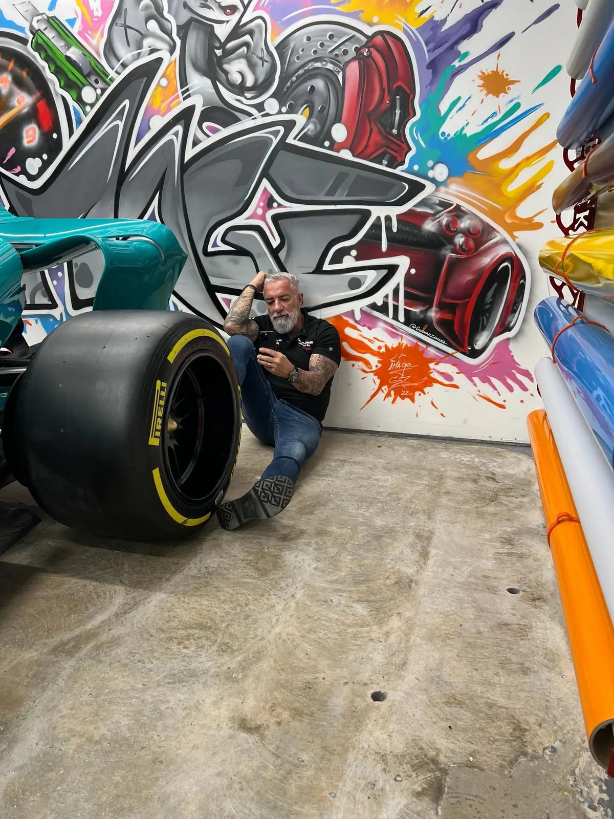 Aston Martin F1 in graffiti garage