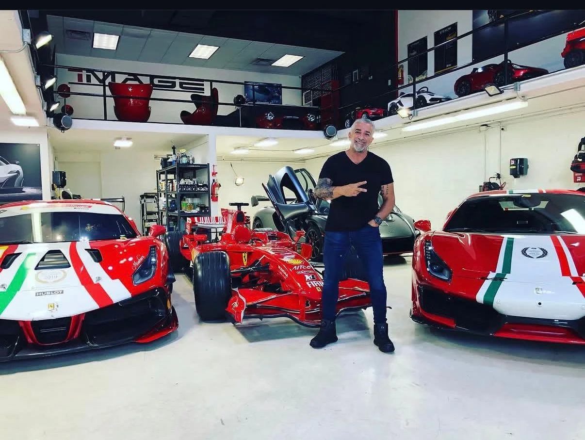 Paulo Goyata in the shop with Ferrari Challenge and Formula 1 cars