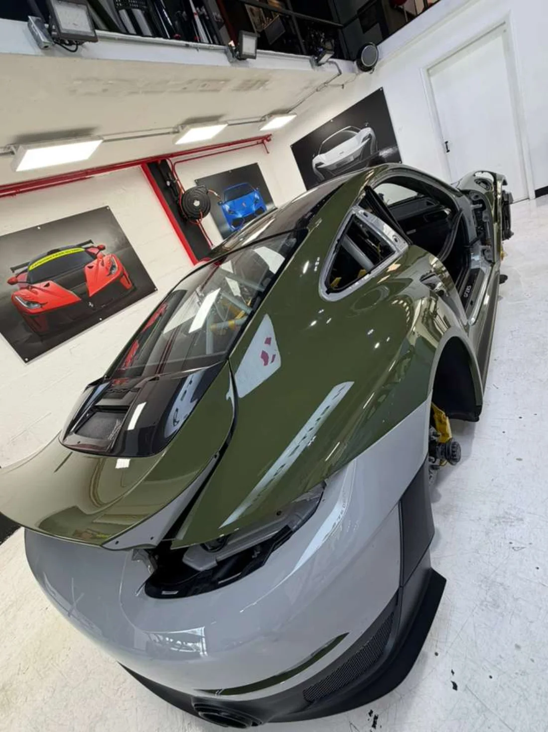 Porsche GT3 RS in a two-tone color-change wrap at the shop