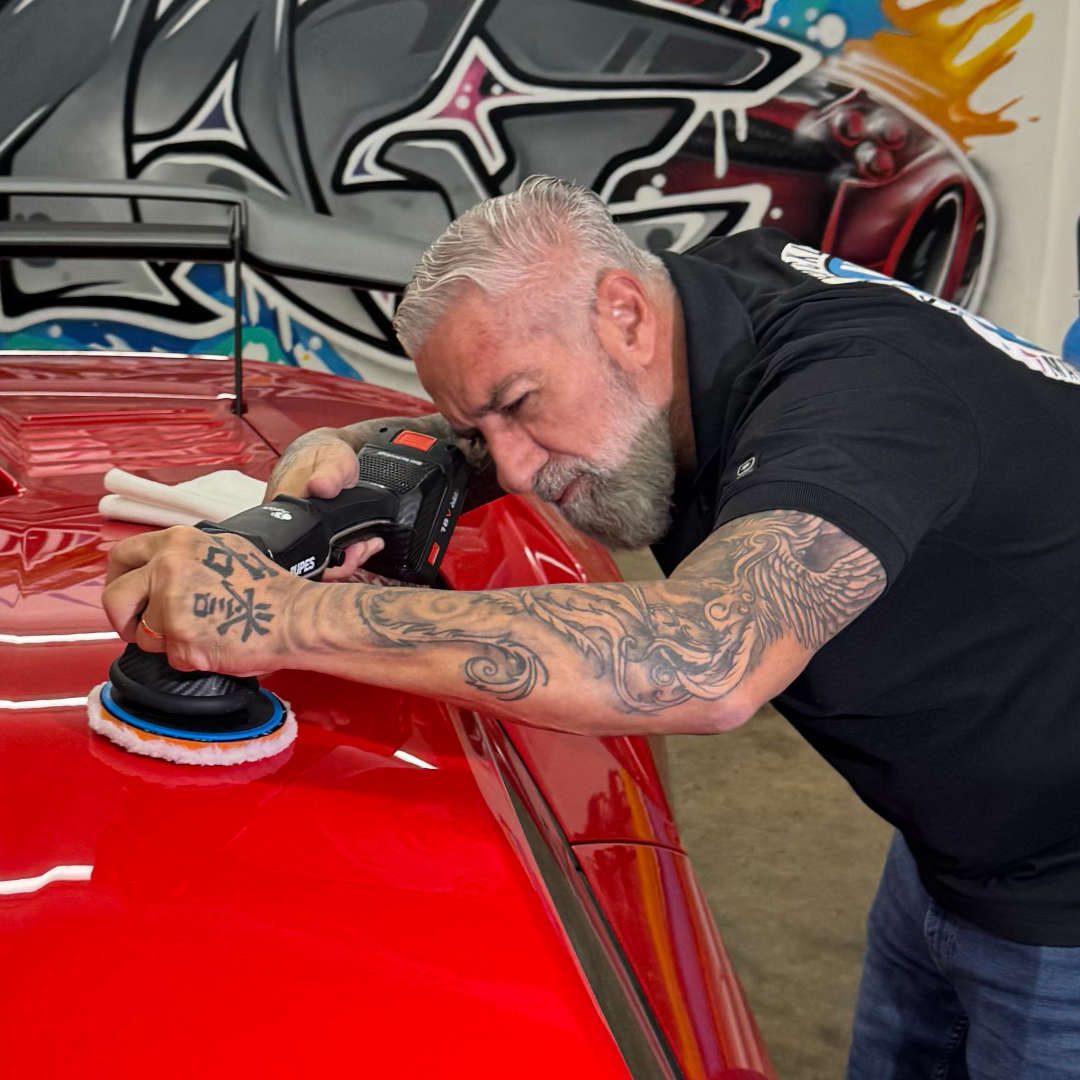 Paulo Goyata polishing a vehicle at IMAGE Premium Detailing